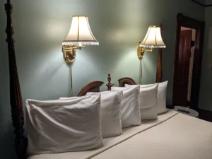 4 pillows on a king; located at The Fairbanks House in Amelia Island.