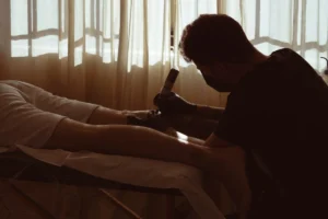 a man lying on a bed